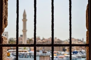 minaret through bars